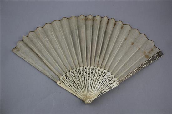 A 19th century French pierced bone fan, overall 10.75in.